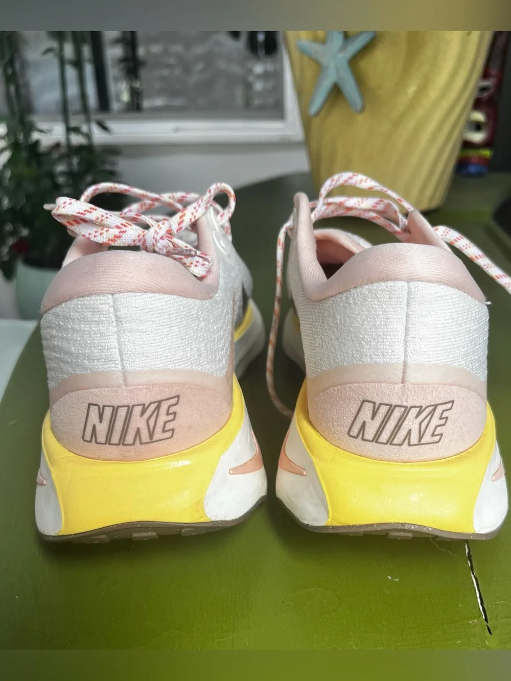 Nike Women’s White Sneakers with Pink Lining and Yellow Trim